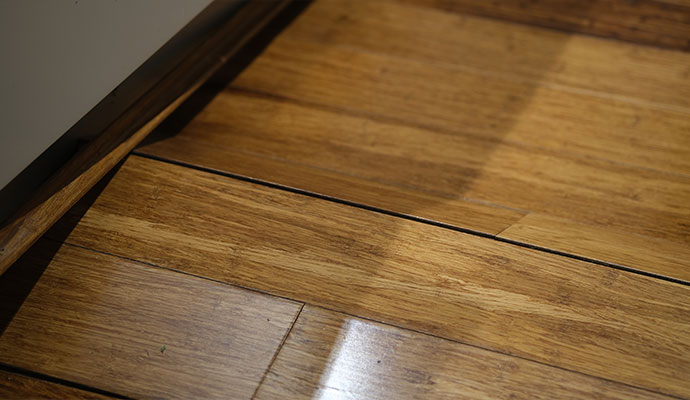 Buckled and sloping wooden floor