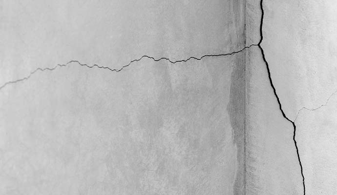 Close-up view of a cracked foundation wall