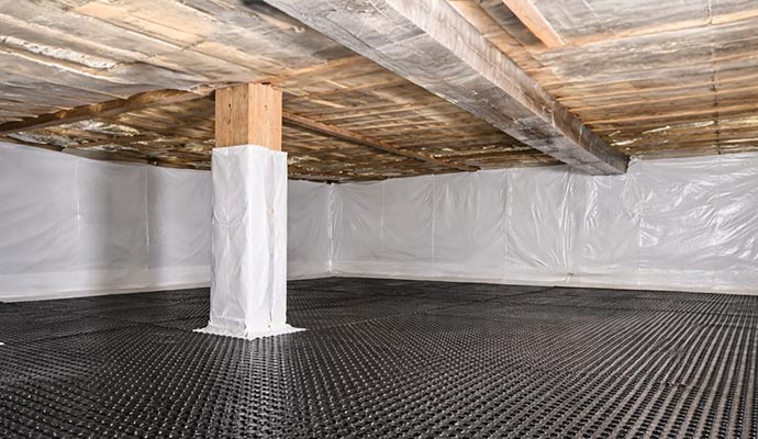 Installed crawl space drainage mat