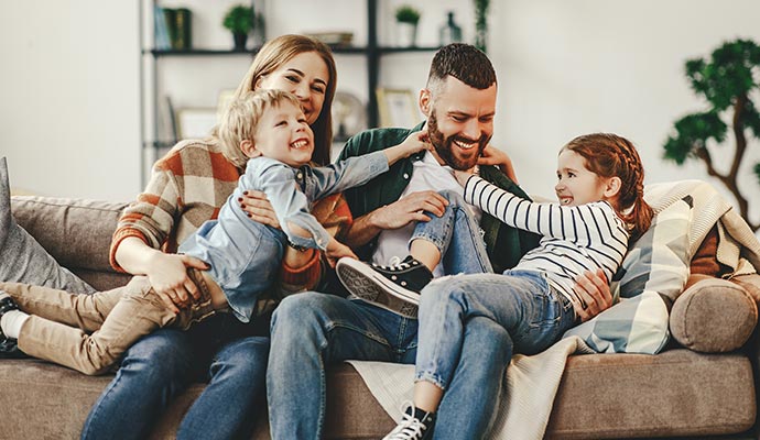 Happy family enjoying good air quality in the room