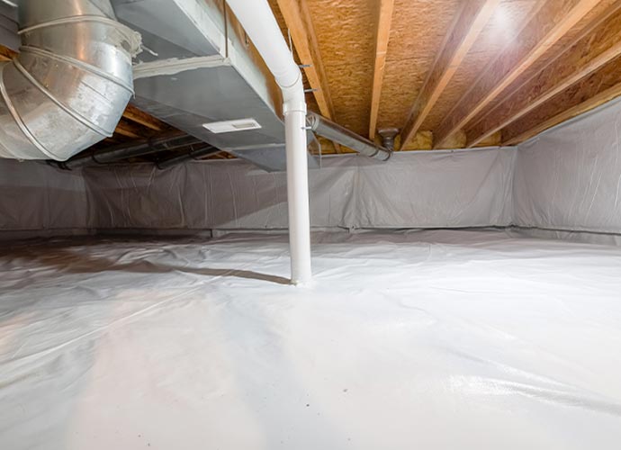 Clean encapsulated crawl space with bright white vapor barrier