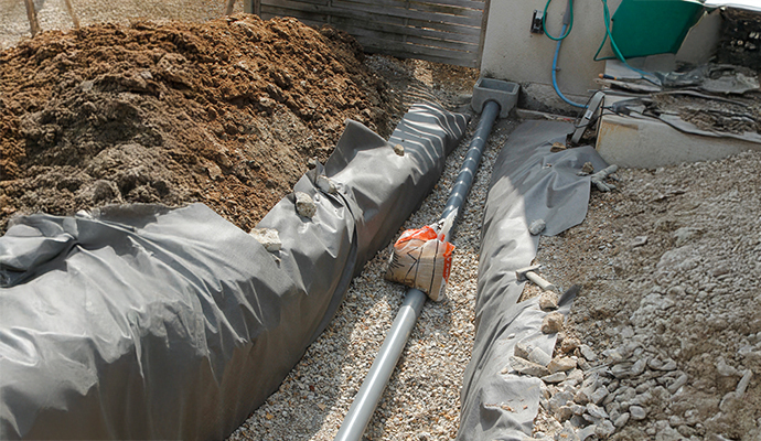 Drainage system installation service at a residential property