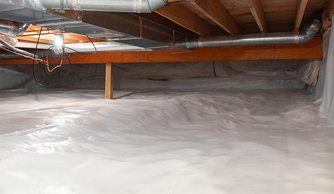 Encapsulated crawl space with bright white vapor barrier