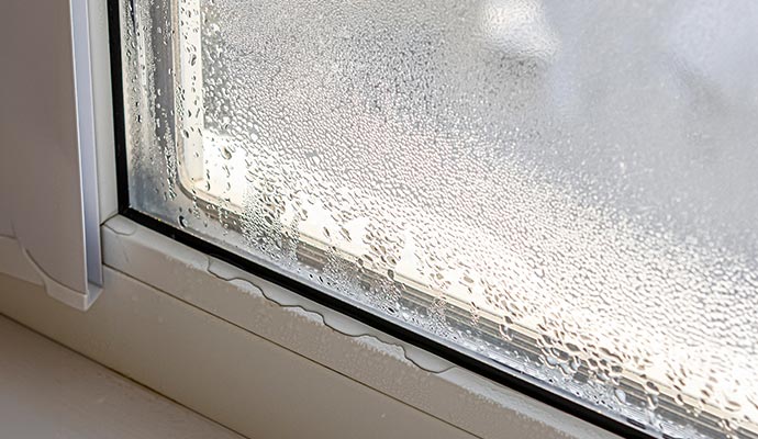 Window condensation indicating a need for humidity control