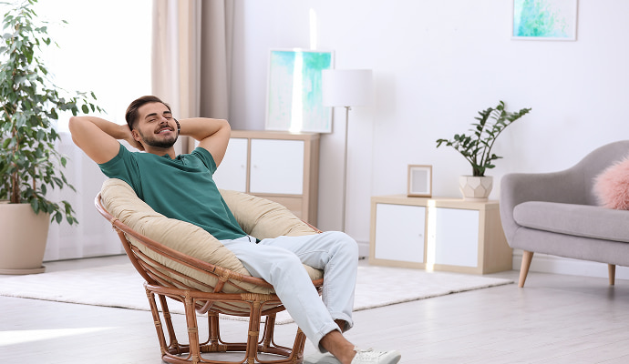 Man relaxing on chair