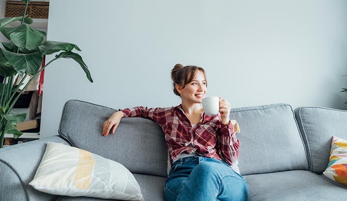 Woman enjoying better indoor air quality