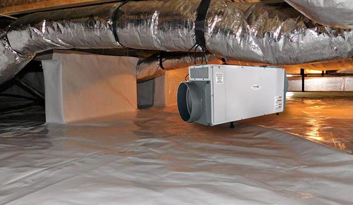 A dehumidifier installed in encapsulated crawl space