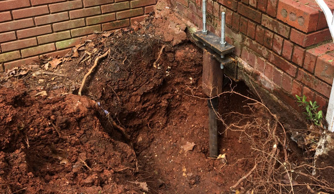 Structural foundation repair for soil settlement