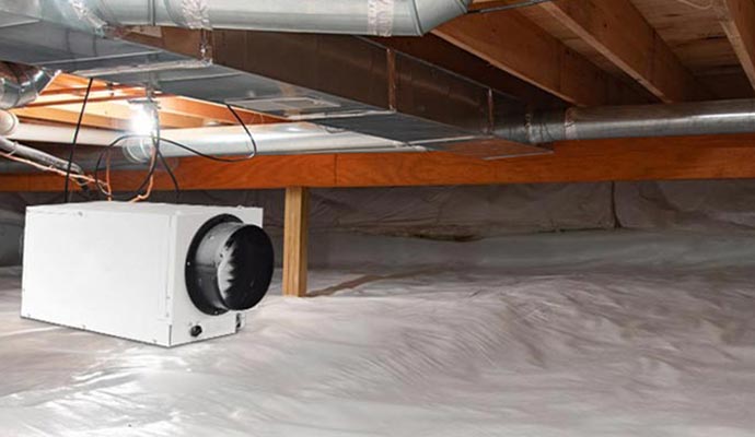 Installed dehumidifier in encapsulated crawl space