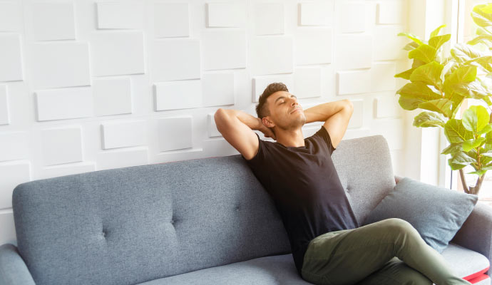 Person relaxing on sofa