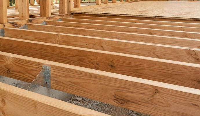 Wooden floor joists and girder framing